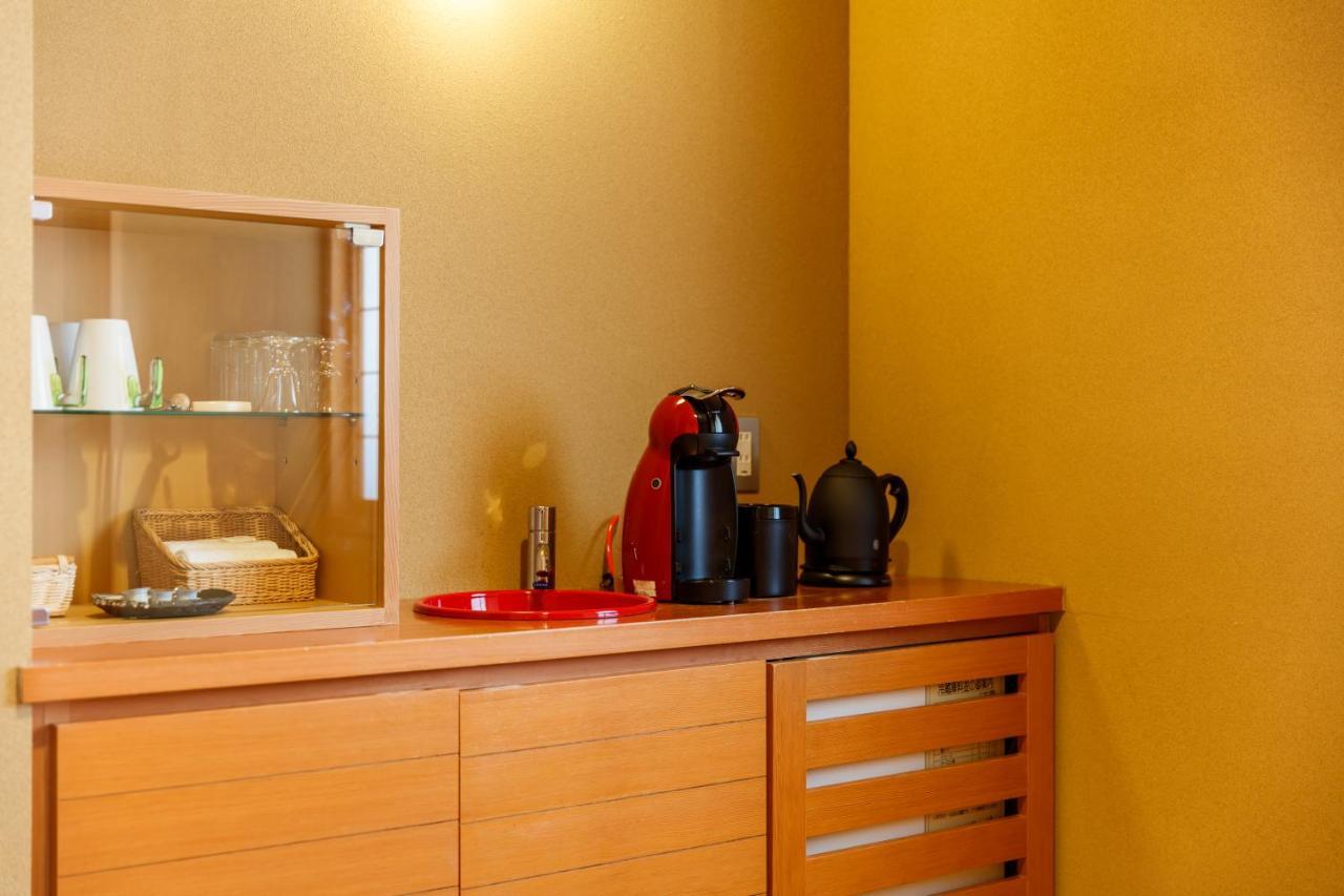 Tachibana Shikitei Hotel Кага Екстериор снимка